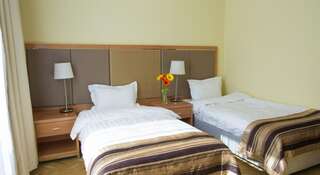 Гостиница Гранд Байкал Байкальск Стандартный двухместный номер с 1 кроватью или 2 отдельными кроватями-1